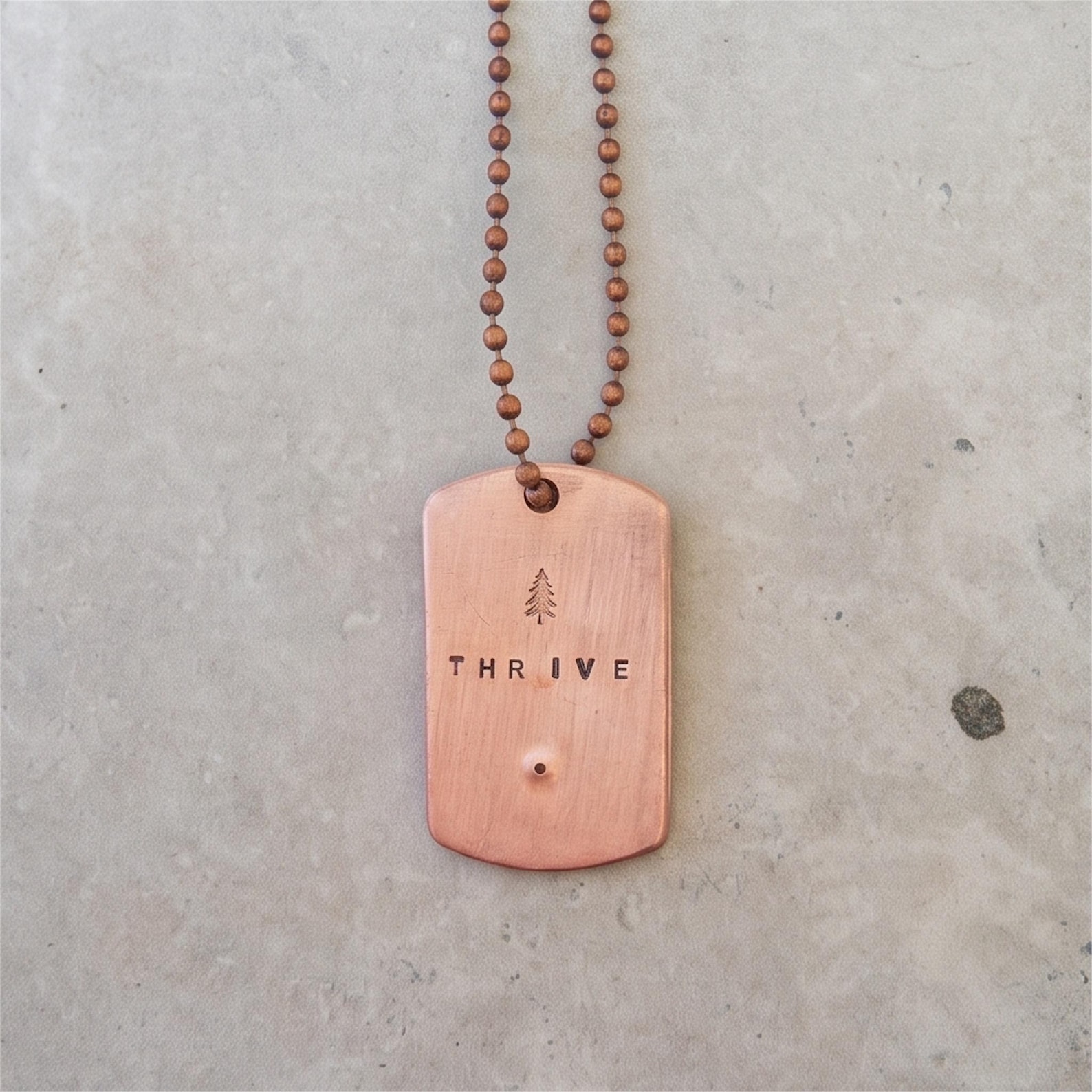 THRIVE necklace, original product photograph